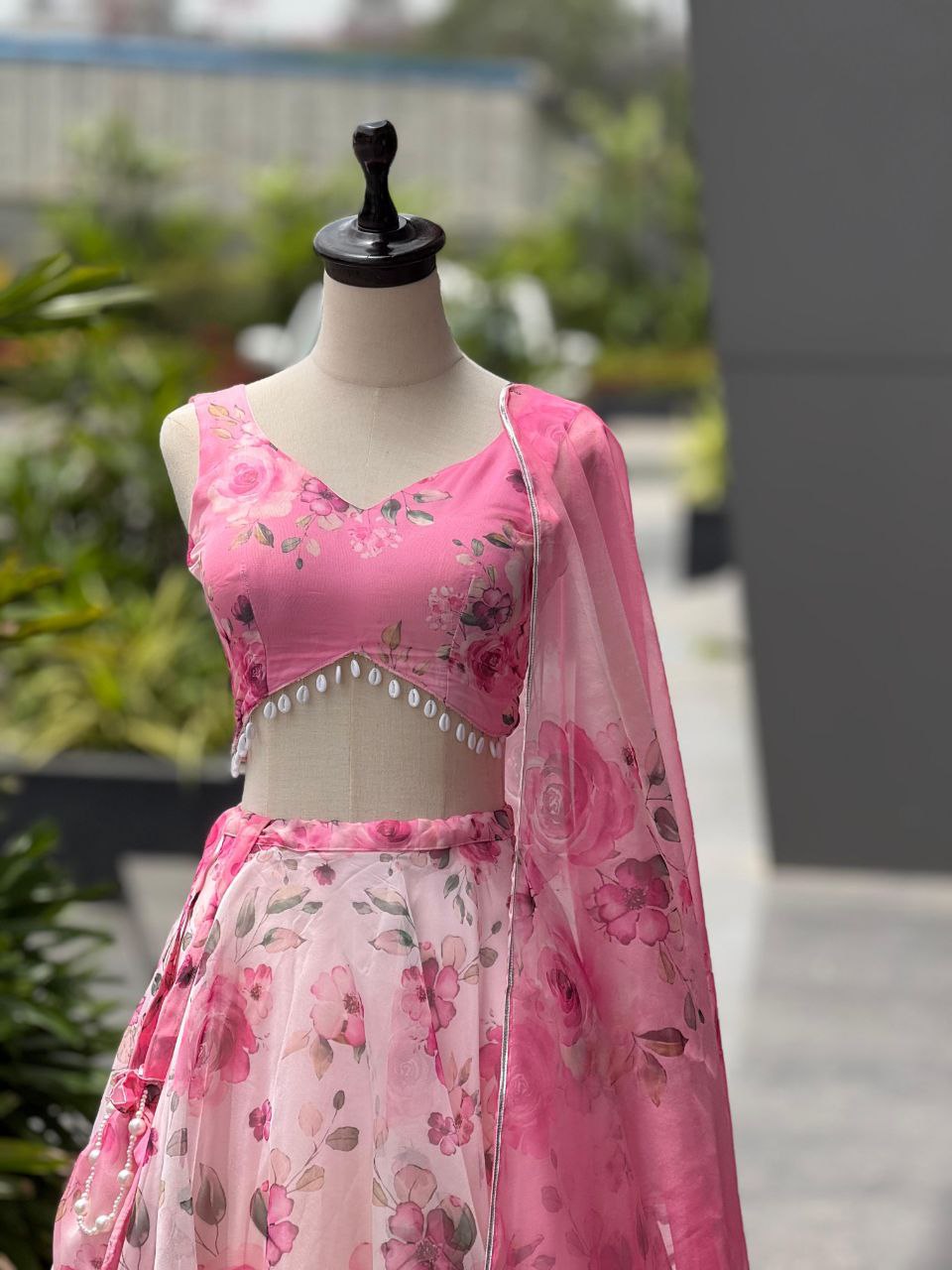 Pink Color Organza Silk Arti Chauhan Wear Fully Stiched Lehenga Choli With Potali Bag