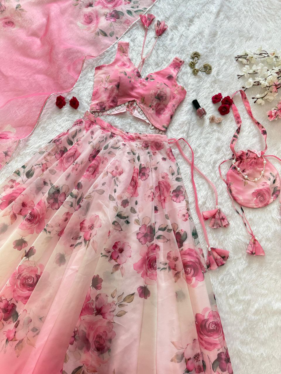 Pink Color Organza Silk Arti Chauhan Wear Fully Stiched Lehenga Choli With Potali Bag