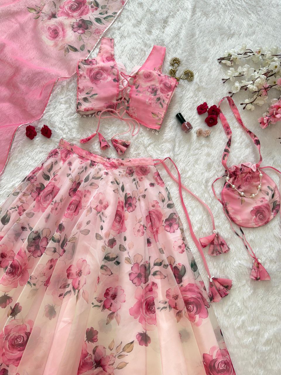 Pink Color Organza Silk Arti Chauhan Wear Fully Stiched Lehenga Choli With Potali Bag