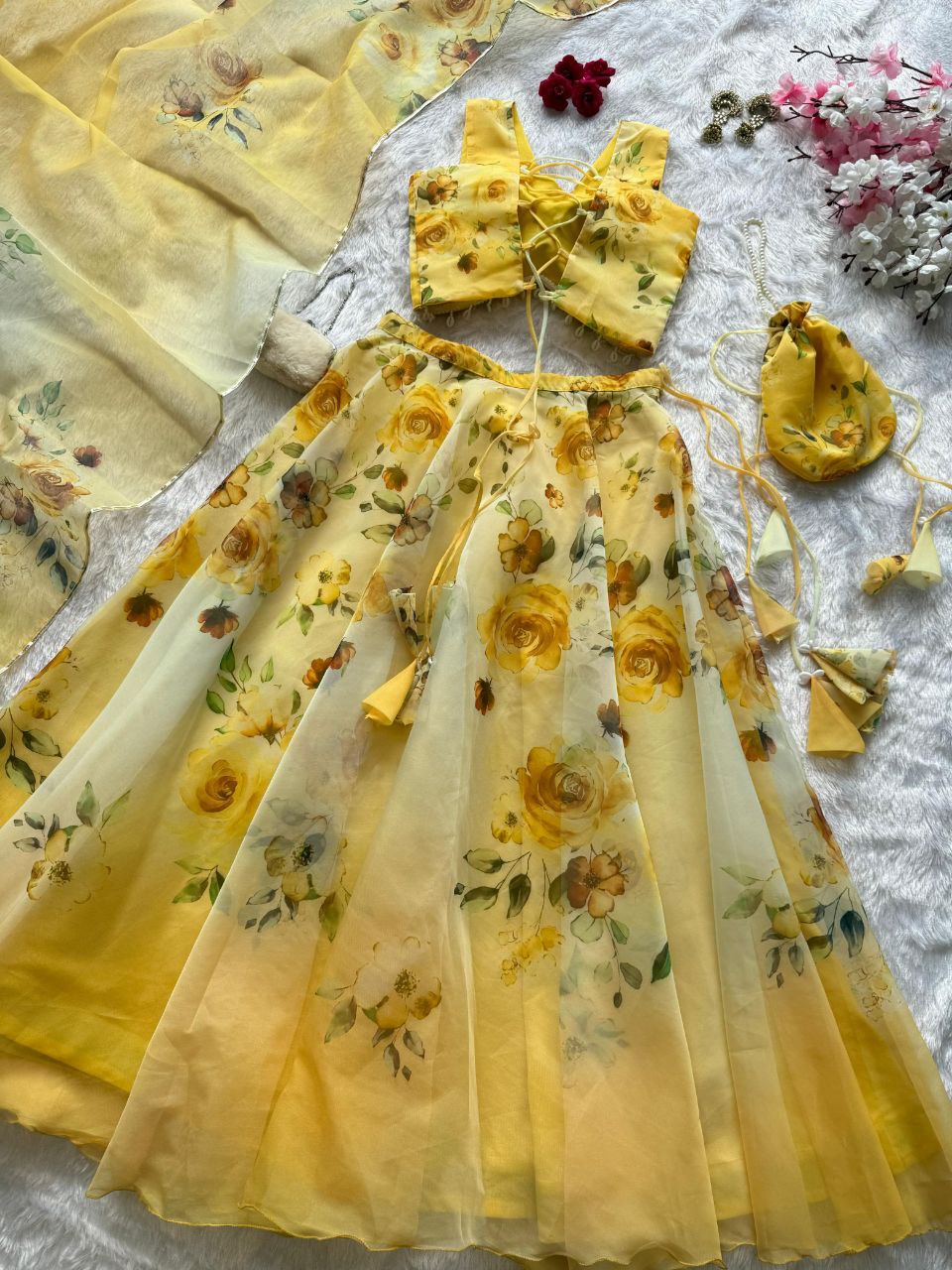 Yellow Color Organza Silk Fully Stiched Lehenga Choli With Potali Bag