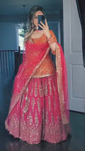 Designer Heavy Embroidered Wedding Wear Orange Top WIth Pink Lehenga Set