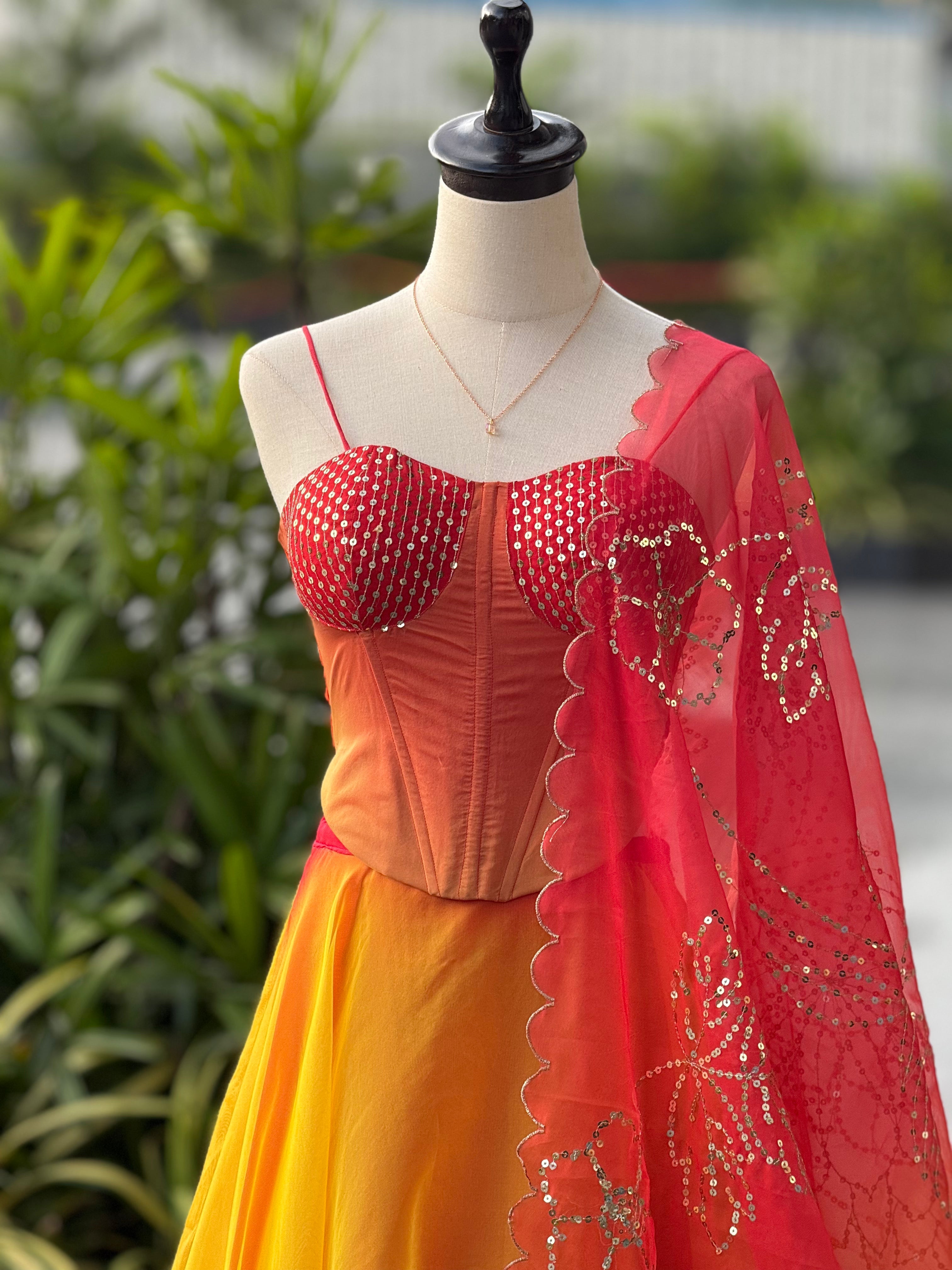 Haldi Function Wear Yellow And Orange Color Lehenga With Trendy Corset Pattern Blouse And Designer Batwa