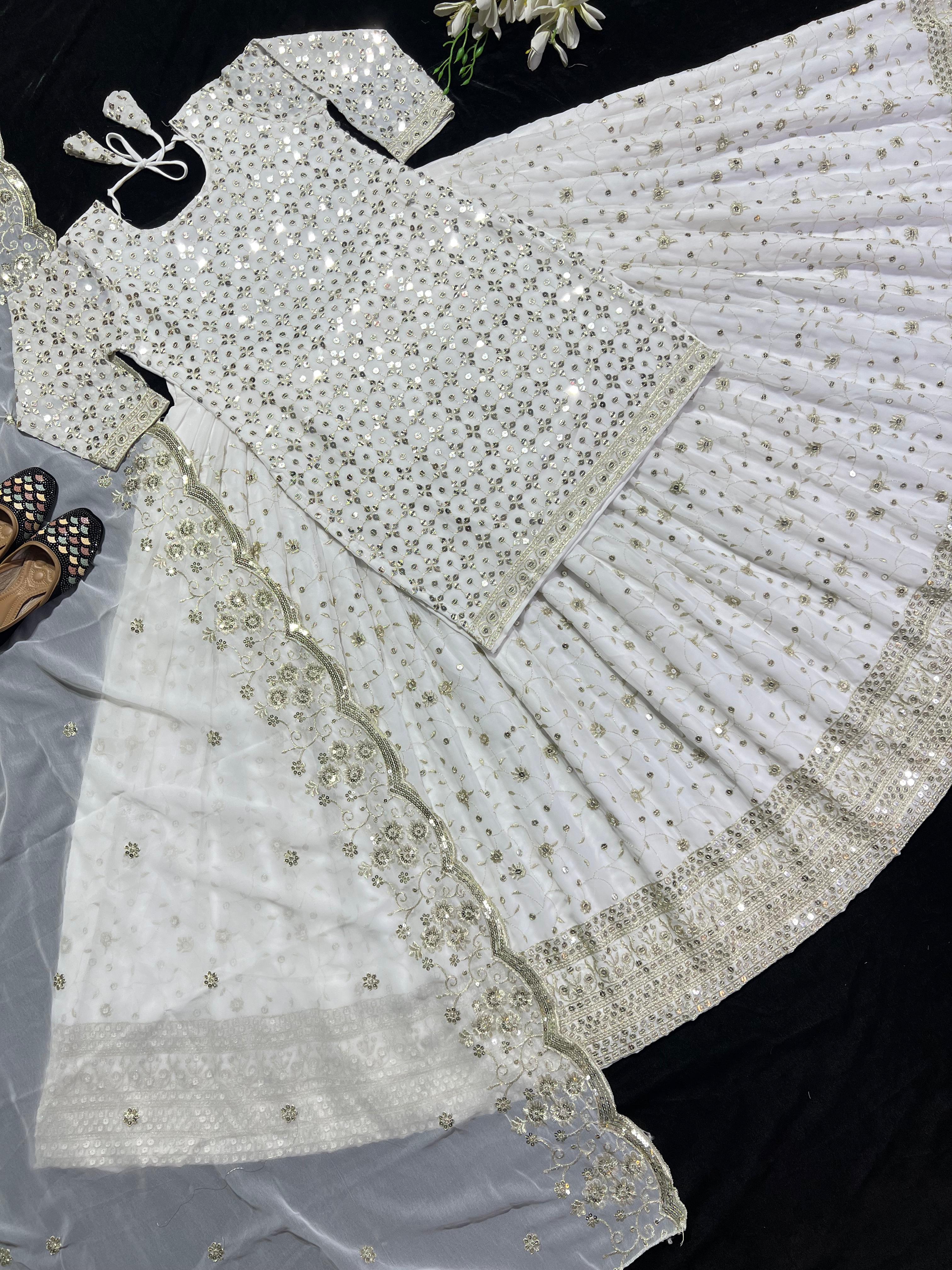 Captivating Embroidery Work White Color Lehenga Suit